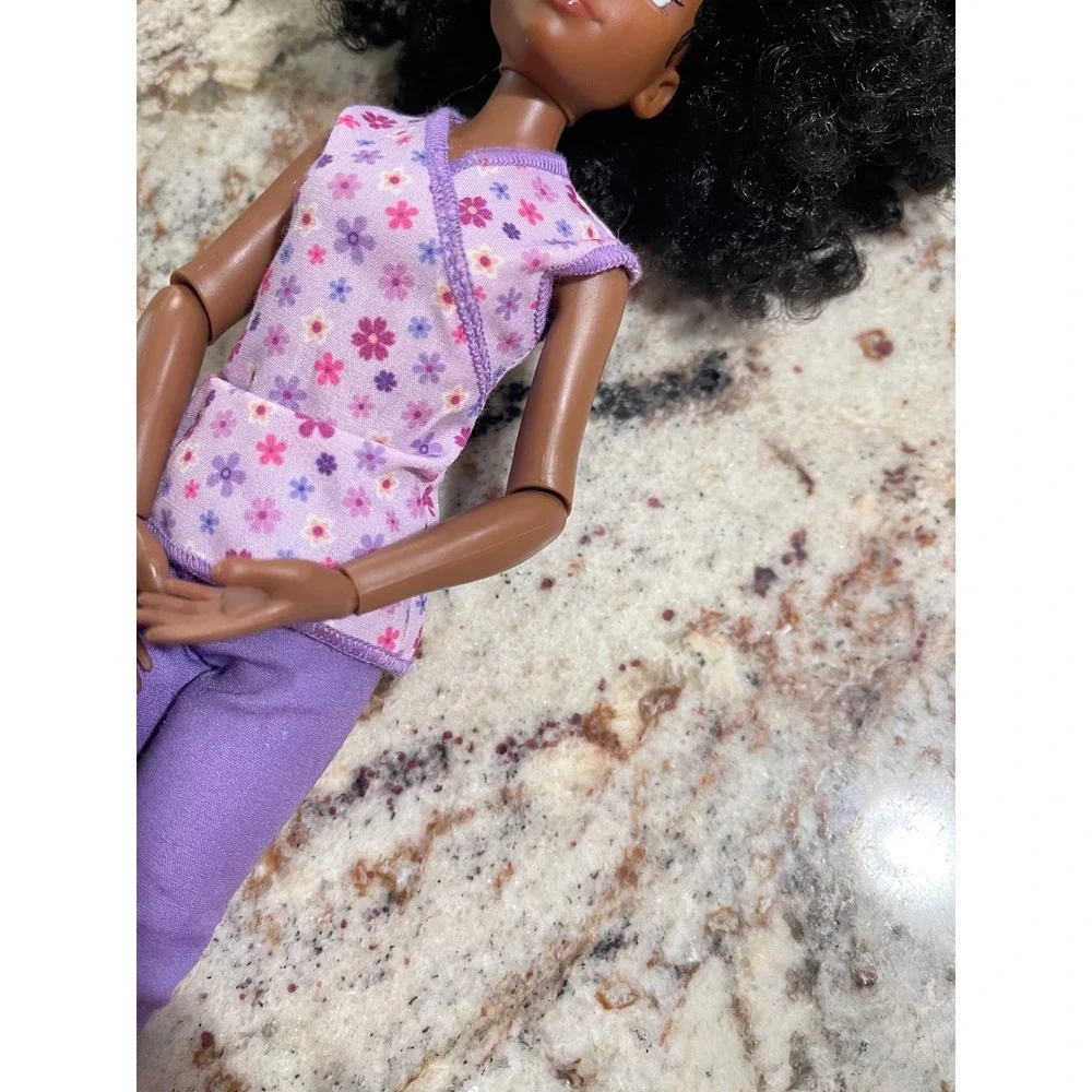 Disney Doll Black Curly Hair Brown Eyes Articulated Floral Top Purple Pants